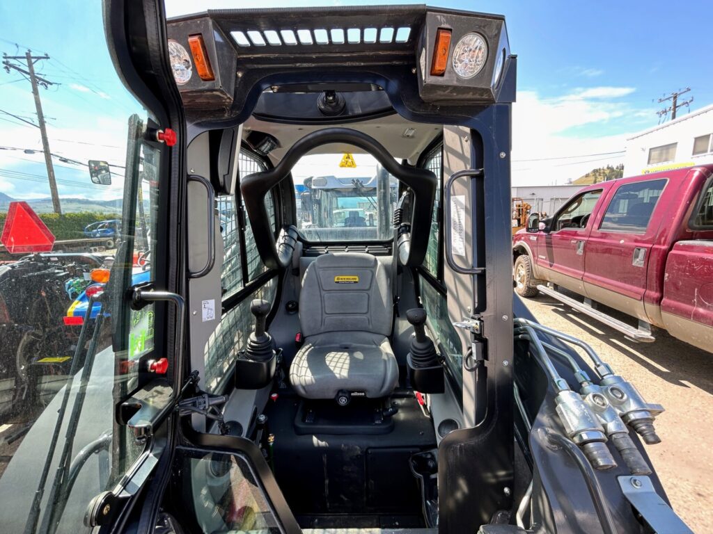 Cab inside of New Holland L328 Skid Steer