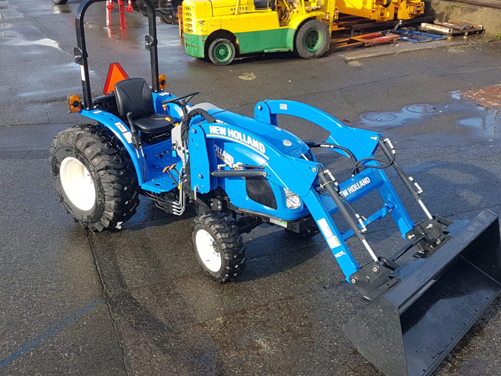 Right front of New Holland Workmaster Tractor