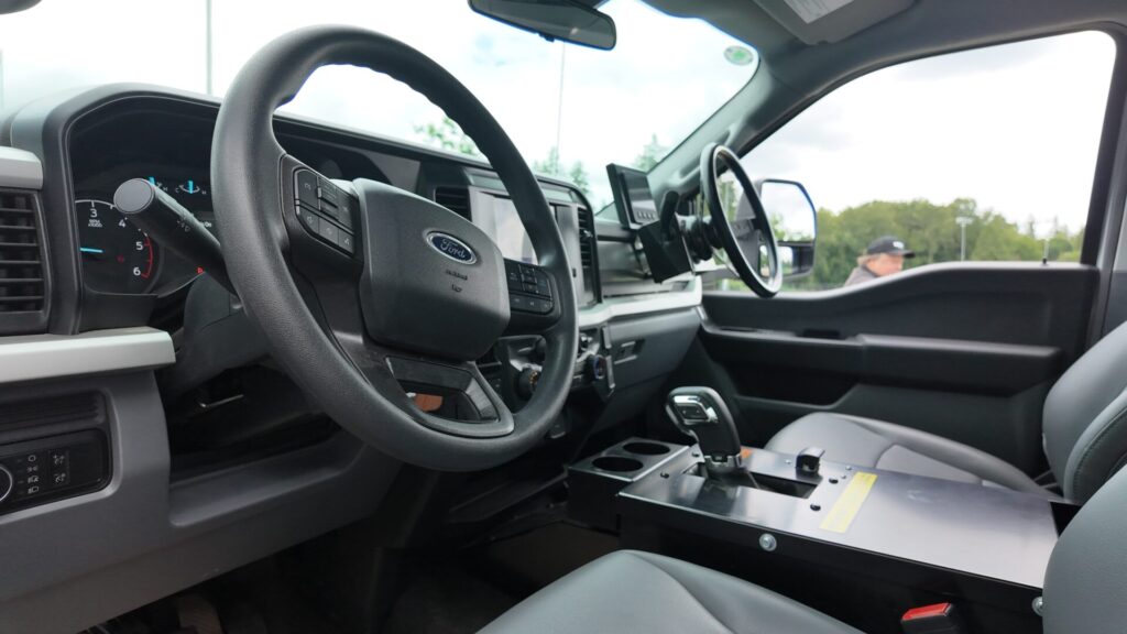 Steering wheel and passenger