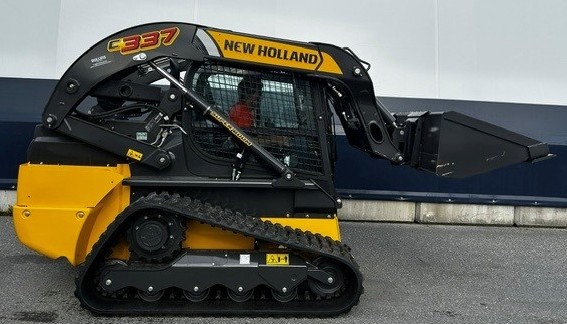 Side of New Holland C337 - Activated Loader